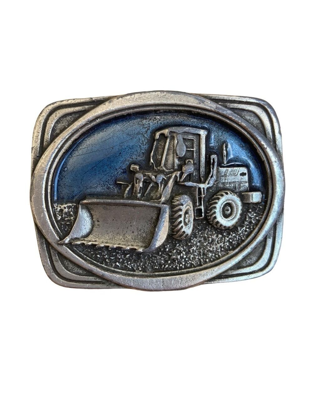 Vintage belt buckle solid metal Tonkin front loader tractor 1986 Tonkin inc. USA